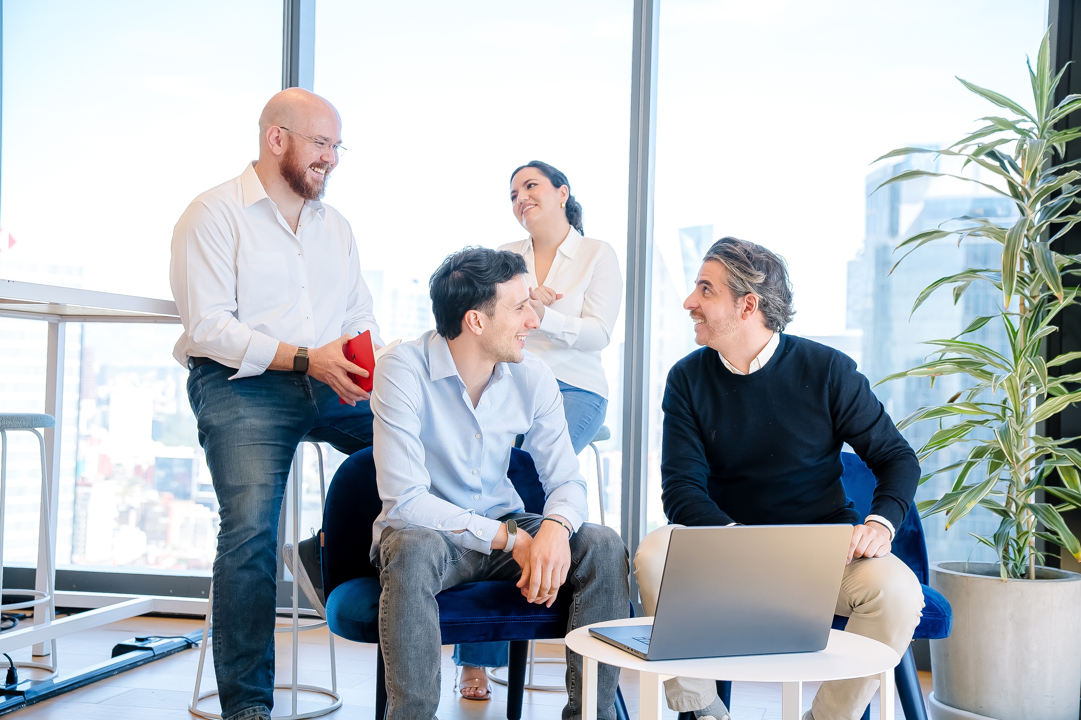 Capital One Mexico City associates stand around and chat