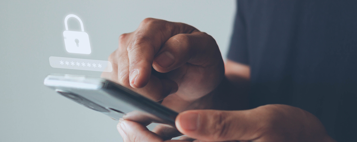 A close up of someone tapping their phone, with a lock illustration coming out of the phone