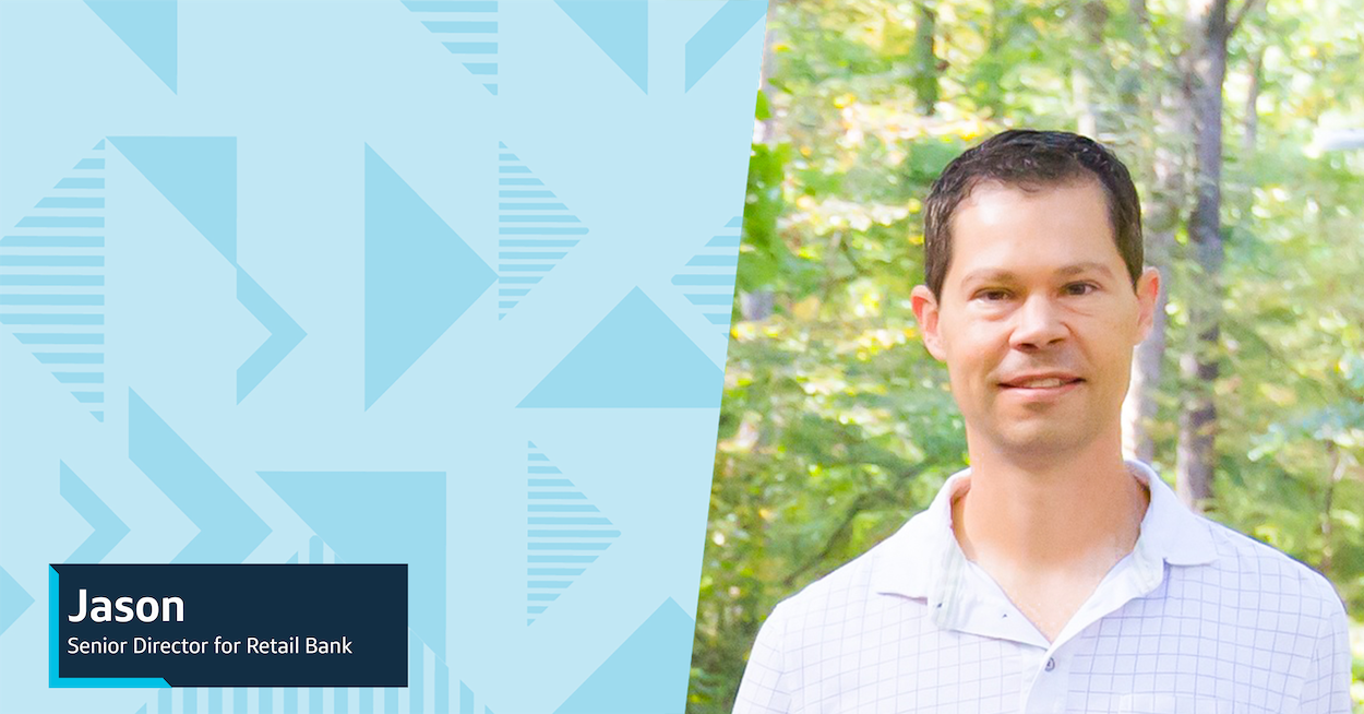 Image of Jason, Capital One Senior Director for Retail Bank, standing in front of trees