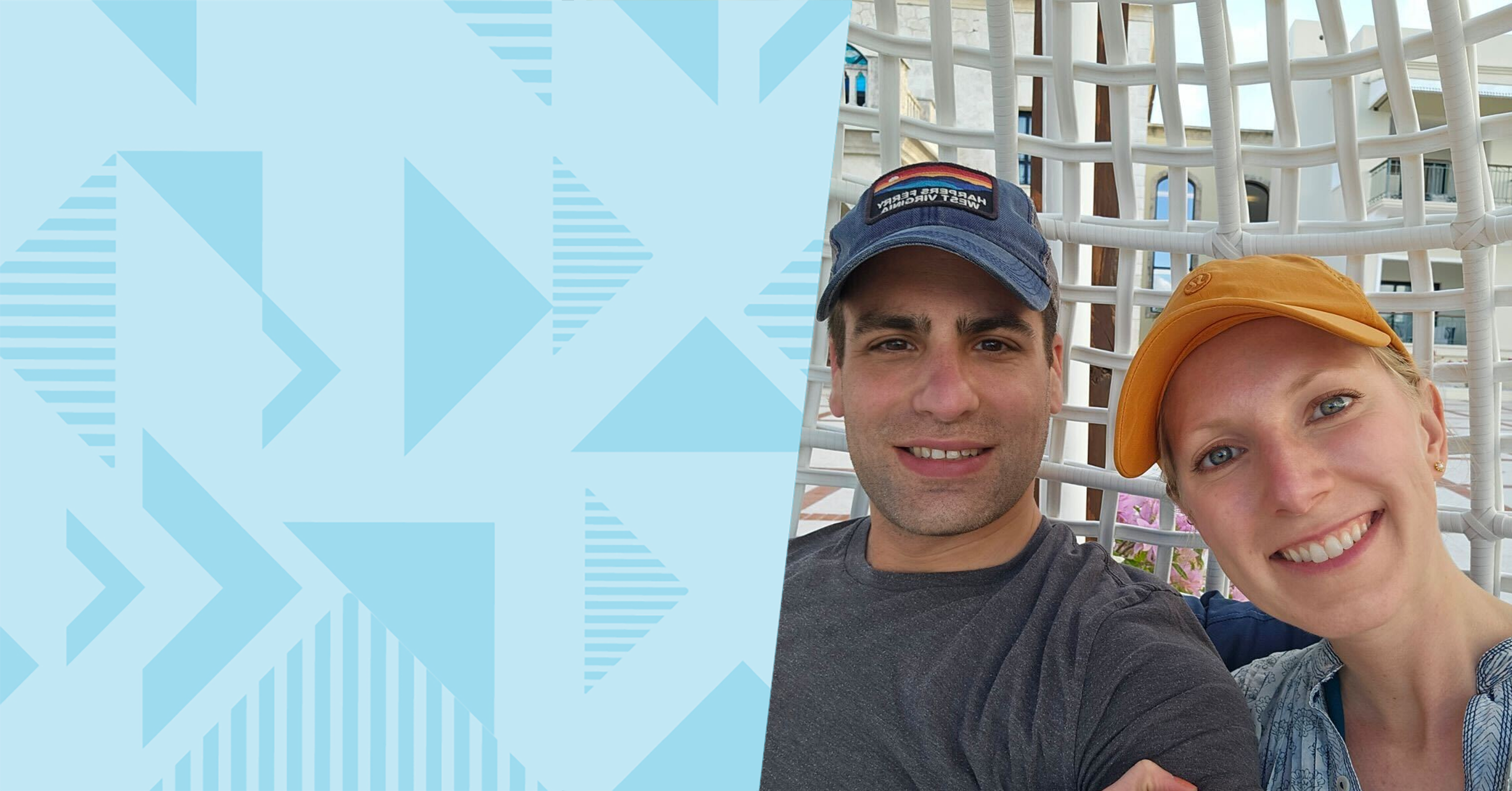 Capital One associate Sarah Ann takes a selfie with her partner, both wearing baseball caps